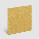Golden bronze finish sample block showing a rich metallic surface treatment for custom bronze sculptures