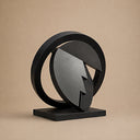 Close-up detail of black stainless steel abstract sculpture SS-023 showing smooth surface finish and handcrafted metal craftsmanship