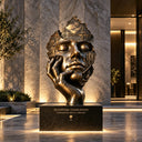 Bronze king head sculpture displayed in a luxury interior