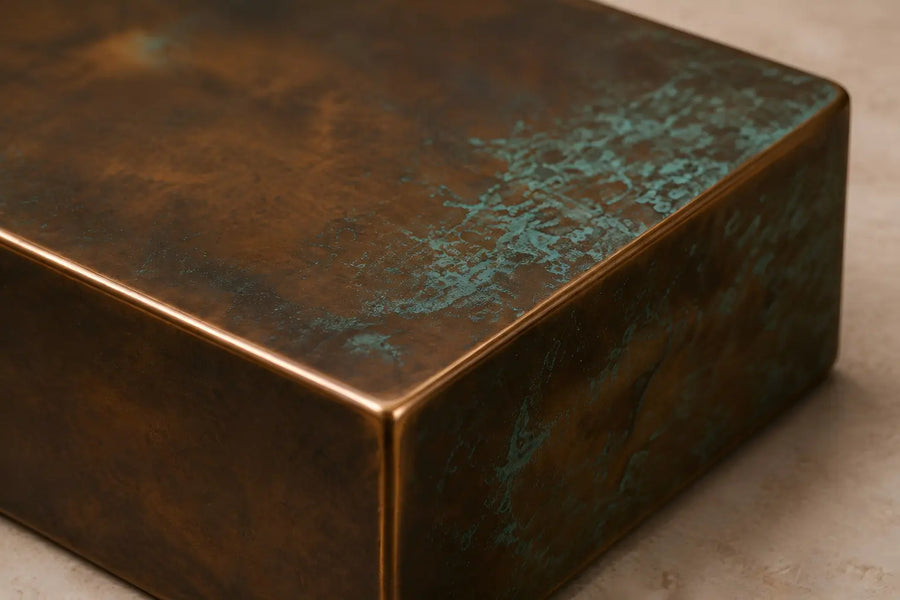 Bronze patina color sample with a green-blue distressed finish