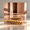 Brown mirror polished stainless steel color sample showing reflective metallic finish options for custom stainless steel sculptures