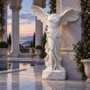 Classical winged goddess marble statue on an outdoor terrace at sunset, with elegant pillars and scenic views, perfect for luxury resort and garden decor.