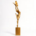 Featured on a pristine white backdrop, this custom bronze woman sculpture details the full anatomical curves and polished golden finish of the figure.