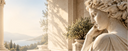 Close-up of a classical white marble female sculpture with intricate carved details in a luxury villa setting, showcasing custom marble sculpture craftsmanship.