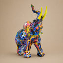 Colorful elephant sculpture on white background