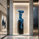 Glossy blue fiberglass woman sculpture with contemporary abstract design for luxury interior spaces