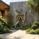 Large bronze melting clock sculpture displayed in a luxury villa garden landscape with modern architecture