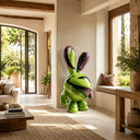 Characterized by a glossy cosmic pop art design, this large colorful fiberglass rabbit sculpture serves as a bold statement piece for a modern luxury interior.