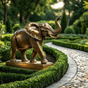 Bronze elephant sculpture displayed in a luxury garden landscape with natural outdoor surroundings BB-007