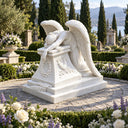 Marble mourning angel memorial MM-024 with feathered wings and an ornate pedestal in a formal garden
