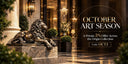 Bronze reclining lion sculpture displayed at a luxury hotel entrance, featured in Origin Sculpture's October Art Season with a 5% collection-wide offer.