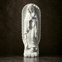 Front view of Our Lady of Guadalupe marble statue MM-025 with a bowed head and prayerful expression