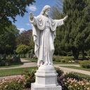 Outdoor Sacred Heart of Jesus marble statue displayed in a memorial  garden.