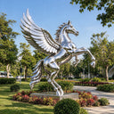 Spanning an impressive wingspan, this outdoor stainless steel horse statue integrates into the estate grounds, showcasing a monumental silhouette of a mythological winged beast.