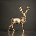 Close-up view of painted stainless steel deer sculpture showing mosaic texture, geometric facets, and handcrafted surface details