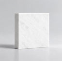 Premium natural white marble sample block with a high-purity crystalline texture and minimal veining