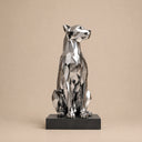 Modern stainless steel dog sculpture on white background