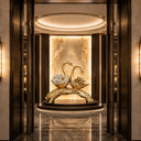 Stainless steel swan couple sculpture in modern hotel lobby