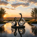 Stainless steel swan couple sculpture with mirror polished finish