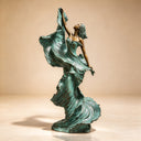 Distinguished by layered folds and bronze-colored raised edges, this dancer statue displays its Antique Bronze finish in a full-length studio view.