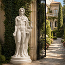 White marble classical male statue placed at a luxury villa entrance with lush greenery and iron gates, ideal for high-end outdoor garden and courtyard decoration.