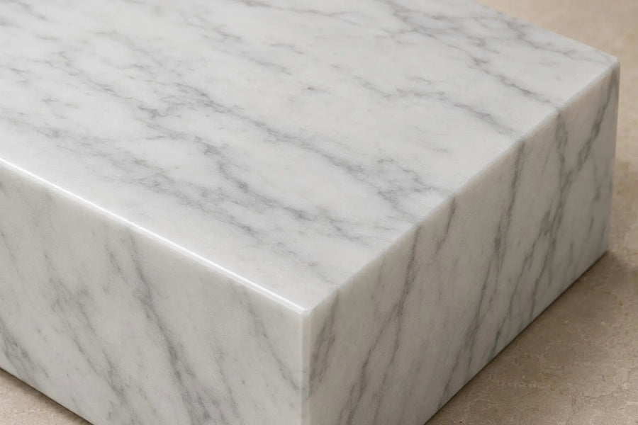 Polished white marble sample with natural gray veining
