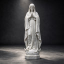 Illuminated against a dark studio setting, this white marble Virgin Mary statue brings out the delicate folds of its robes and the intricate details of the hand-carved Marian sculpture.