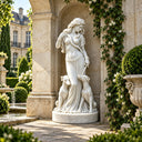 White marble woman with two dogs statue MM-030 displayed in a landscaped European-style luxury estate courtyard